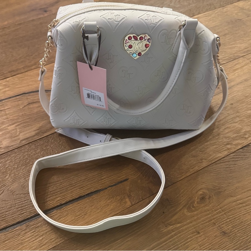 NWT Juicy Couture satchel with embossed pattern and hearts embellishment